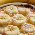 Southern Banana Cobbler dessert with sliced bananas and biscuit topping
