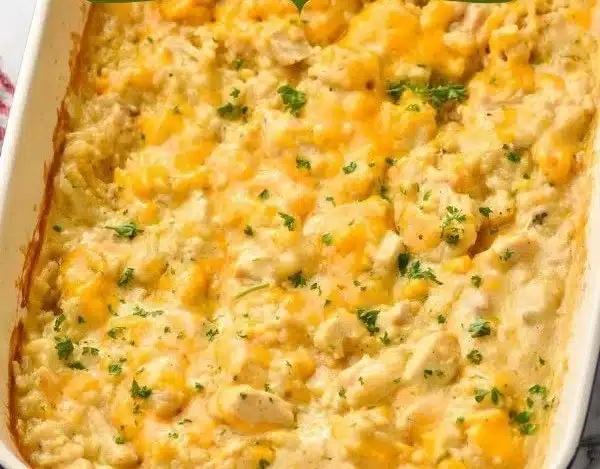 Baked chicken and rice casserole served in a dish with vegetables