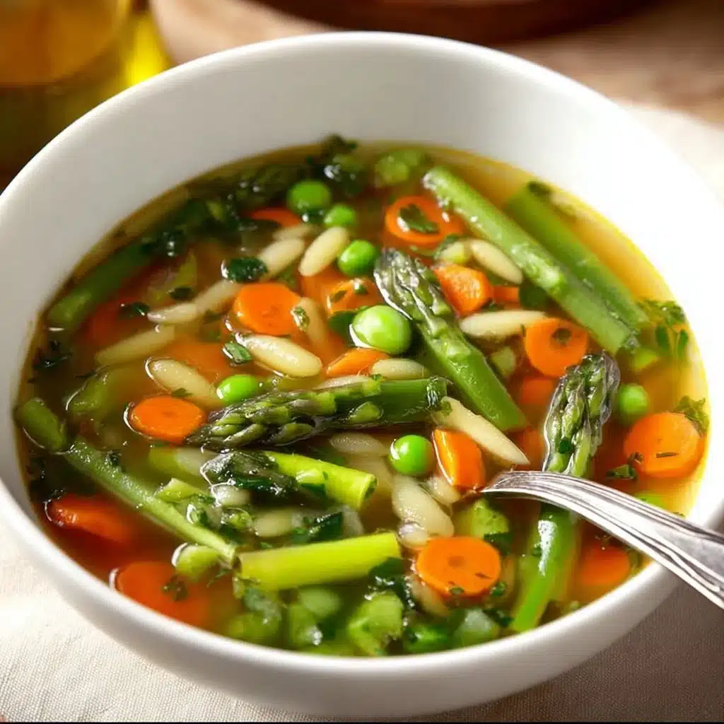 Bowl of vibrant spring vegetable soup with fresh seasonal vegetables