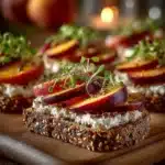 Peach Burrata Crostini with fresh peaches and creamy burrata on toasted bread.